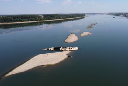 The Serbian government has previously tried to remove wrecks such as the one pictured here near Prahovo.Photograph: Darko Vojinović/AP
