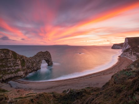 Sunset at Durdle Door in Dorset’s Jurassic coast.Photograph: Loop Images/Universal Images Group/Getty Images