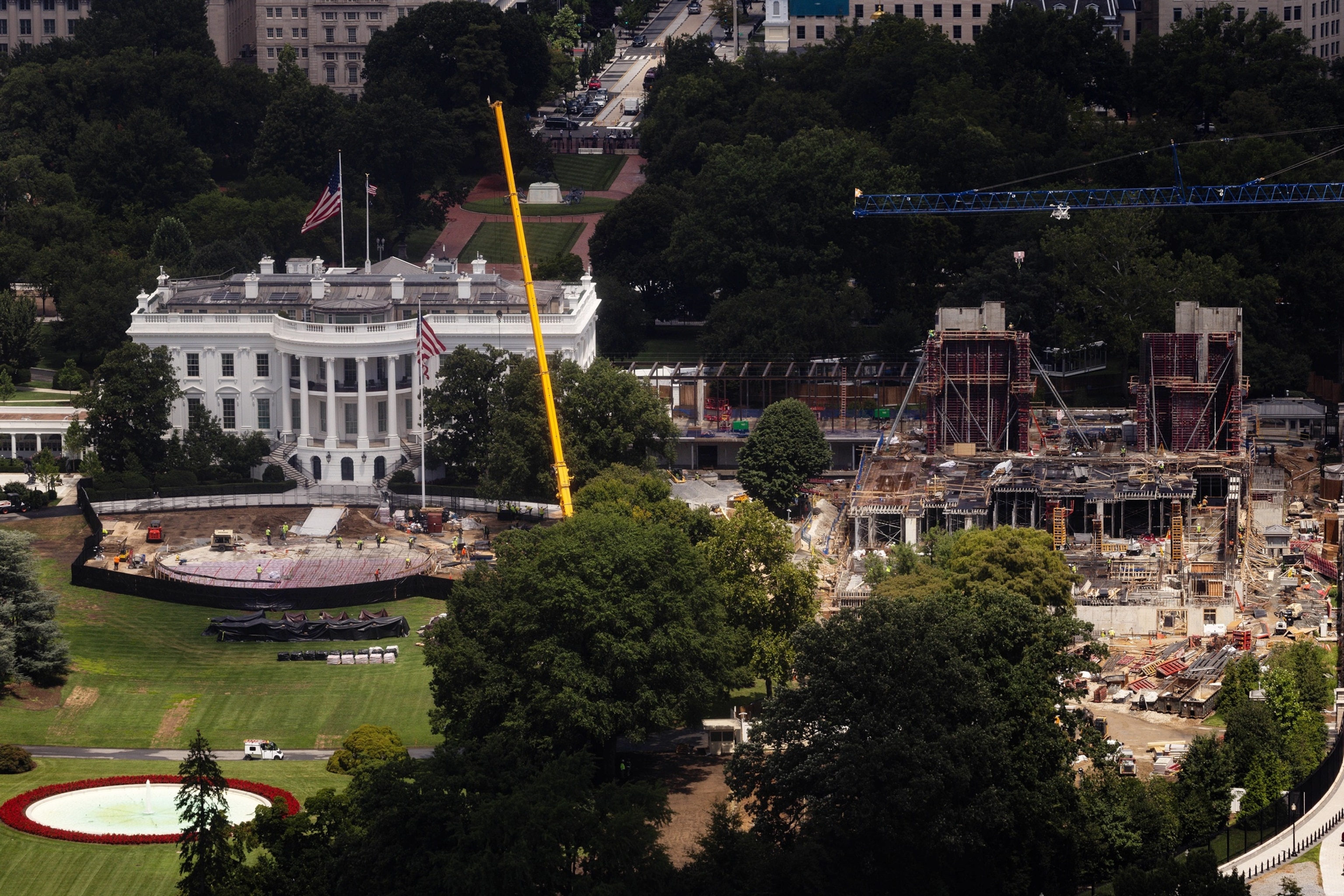 Construction continues on a helipad and the White House Ballroom on the South Lawn of the White House, Wednesday, Aug. 5, 2026, in Washington.Tierney L. Cross/AP Photo