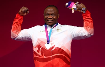 Cyrille Tchatchet after winning a weighlifting silver medal at the Games in Glasgow.Photograph: Dean Mouhtaropoulos/Getty Images