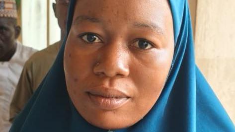 Image caption,Amina Alhassan, 24, says she could not have afforded to get married at the moment had it not been for the mass wedding scheme