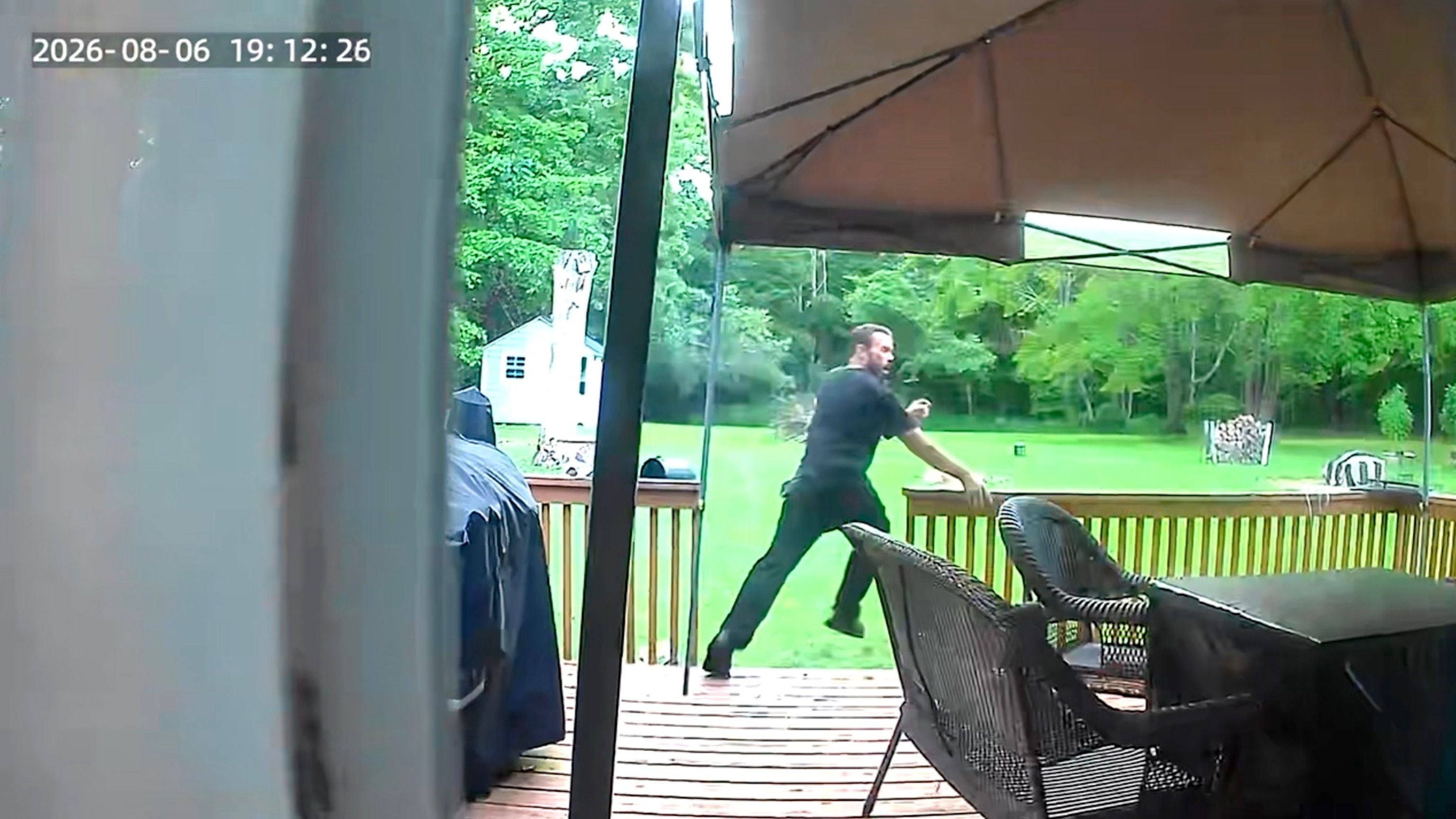 In this screen grab from a Ring camera video, which appears to show suspect Thomas Ryan running from the house in Greenville, N.Y.