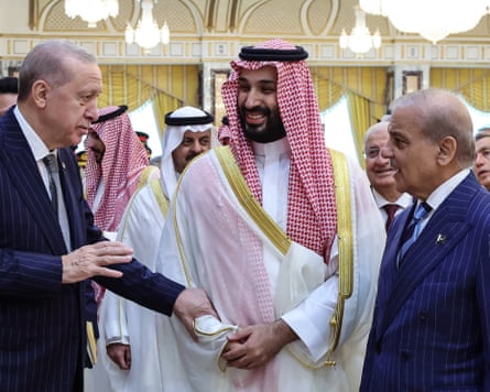 Turkey’s Recep Tayyip Erdoğan, left, with Saudi Arabia’s Prince Mohammed bin Salman and Pakistan’s Shehbaz Sharif on Friday.Photograph: Turkish Presidency Press Office/AFP/Getty Images