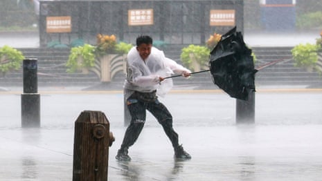 Typhoon Dolphin batters parts of east and south-east Asia – video