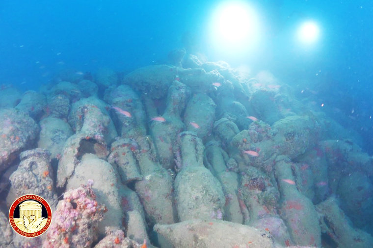 The amphorae were discovered inside the shipwreck, alongside lead anchor stocks and other artifacts.Italian Ministry of Culture