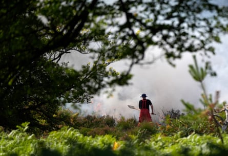 More than 120 firefighters are tackling the blaze near the A31 after a vehicle fire spread to the nearby heathland on Sunday.Photograph: Andrew Matthews/PA