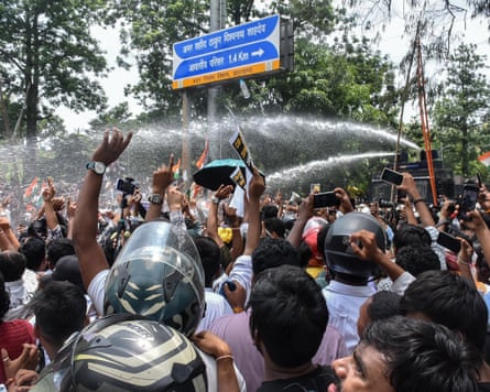 Police use water cannon to disperse demonstrators during a protest.Photograph: Rajesh Kumar/AFP/Getty Images