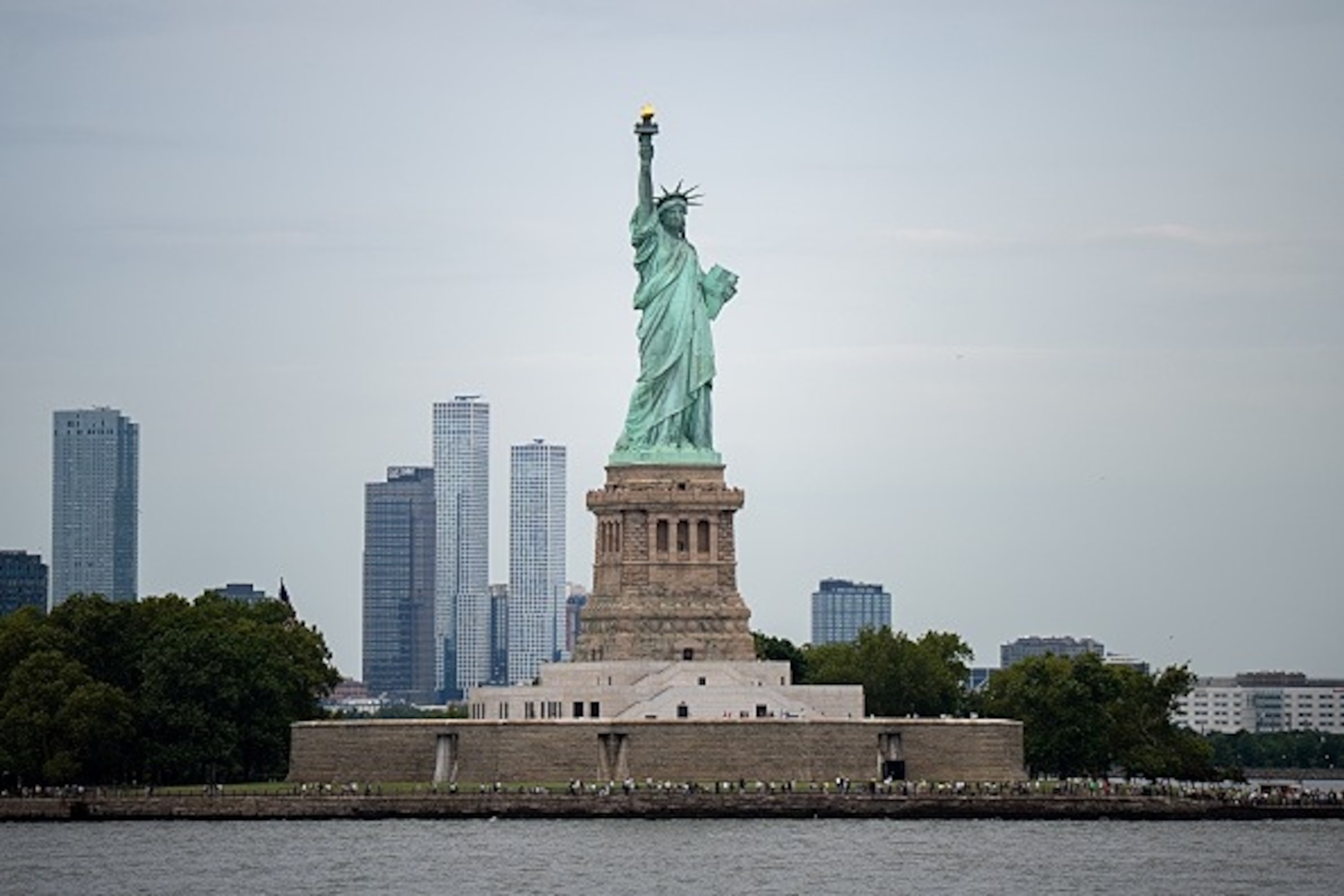 The New York Police Department said a 27-year-old woman and a 5-month-old girl were killed, August 8, 2026, when the boat they were aboard capsized near Liberty Island in New York Harbor, pictured here.Nurphoto/NurPhoto via Getty Images