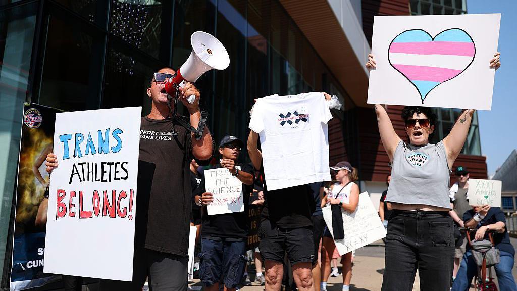 Image caption,Demonstrators protest before the WNBA matches between Minnesota Lynx and Indiana Fever earlier in August
