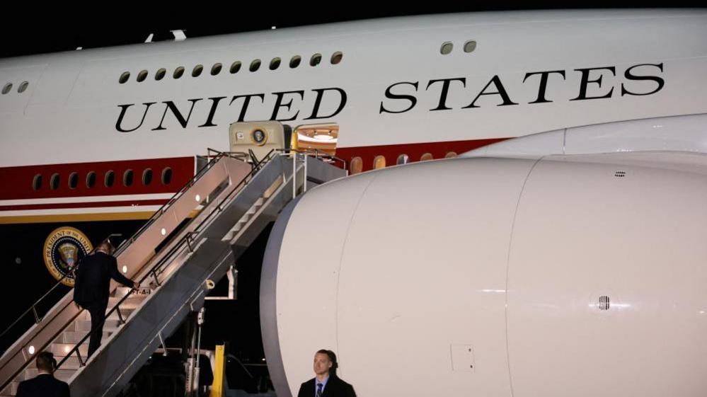 Image caption,Trump spoke about the threat to him from Iran after boarding the presidential jet given to him by Qatar