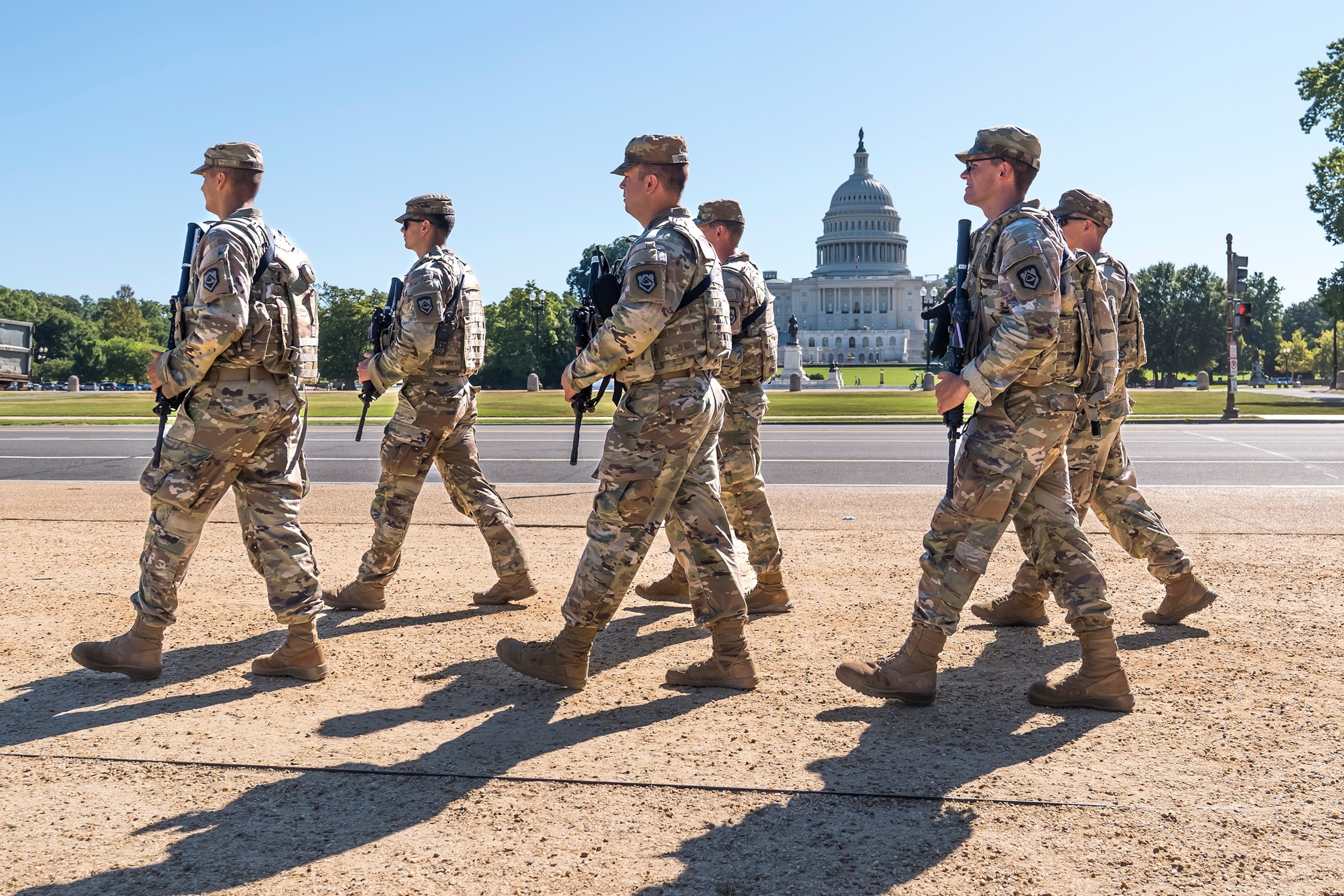 Armed National Guard soldiers from West Virginia patrol the Mall near the Capitol in Washington, as part of President Donald Trump's order to impose federal law enforcement in the nation's capital, Aug. 26, 2025.J. Scott Applewhite/AP, FILE