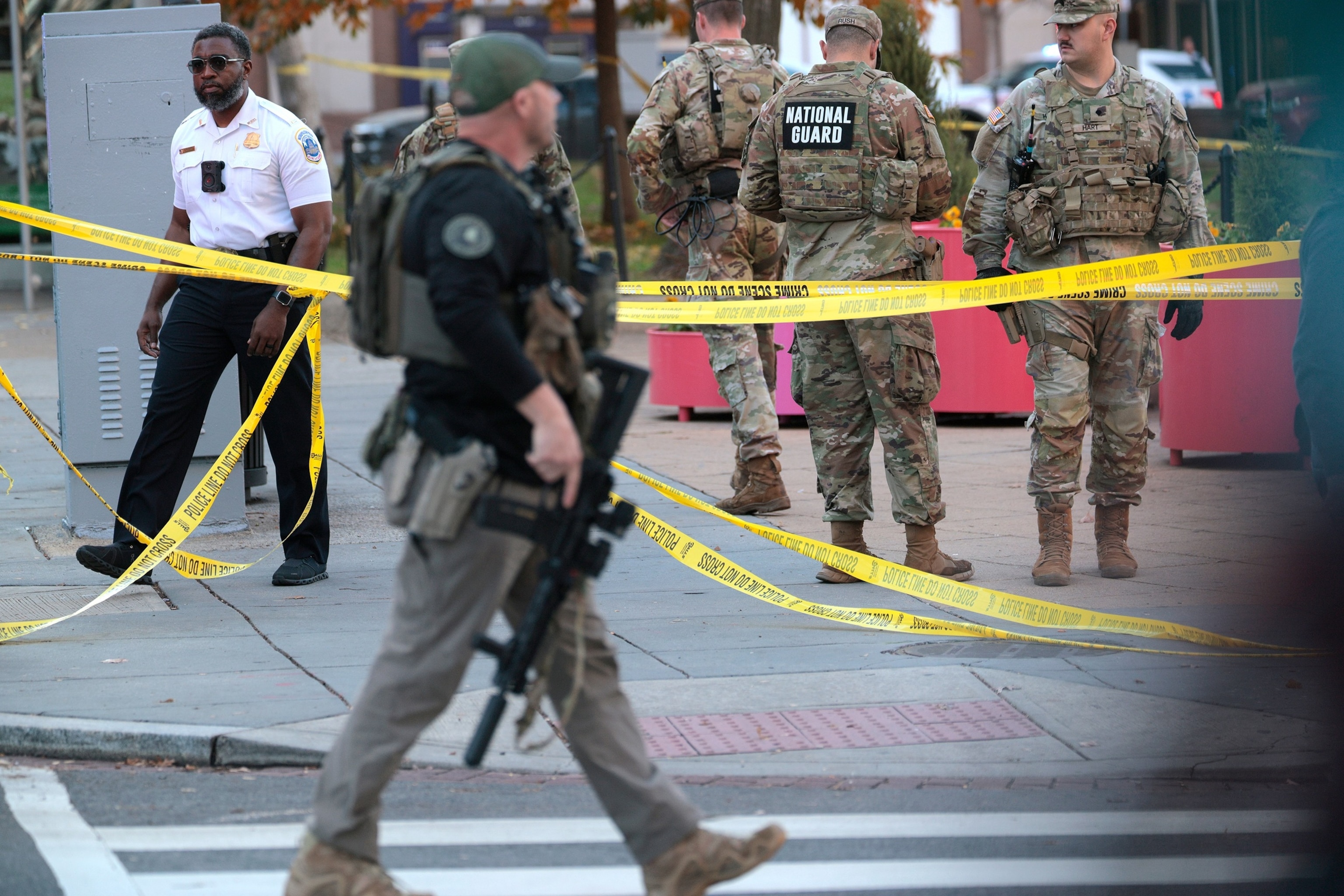 Members of law enforcement and National Guard soldiers respond to a shooting near the White House, Nov. 26, 2025, in Washington, D.C.Chip Somodevilla/Getty Images