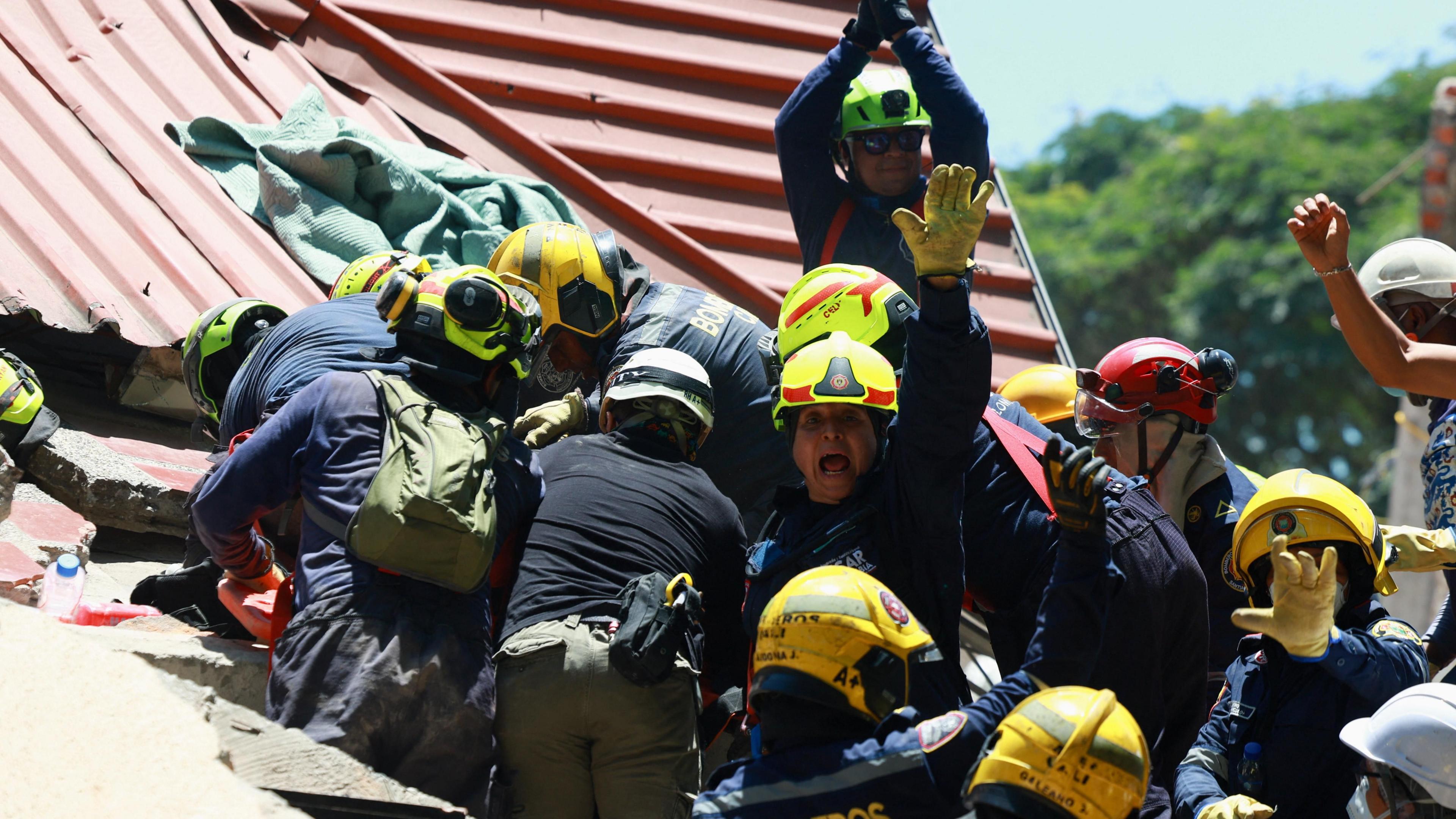 Image caption,Firefighters in Cali have worked to pulled survivors free from rubble