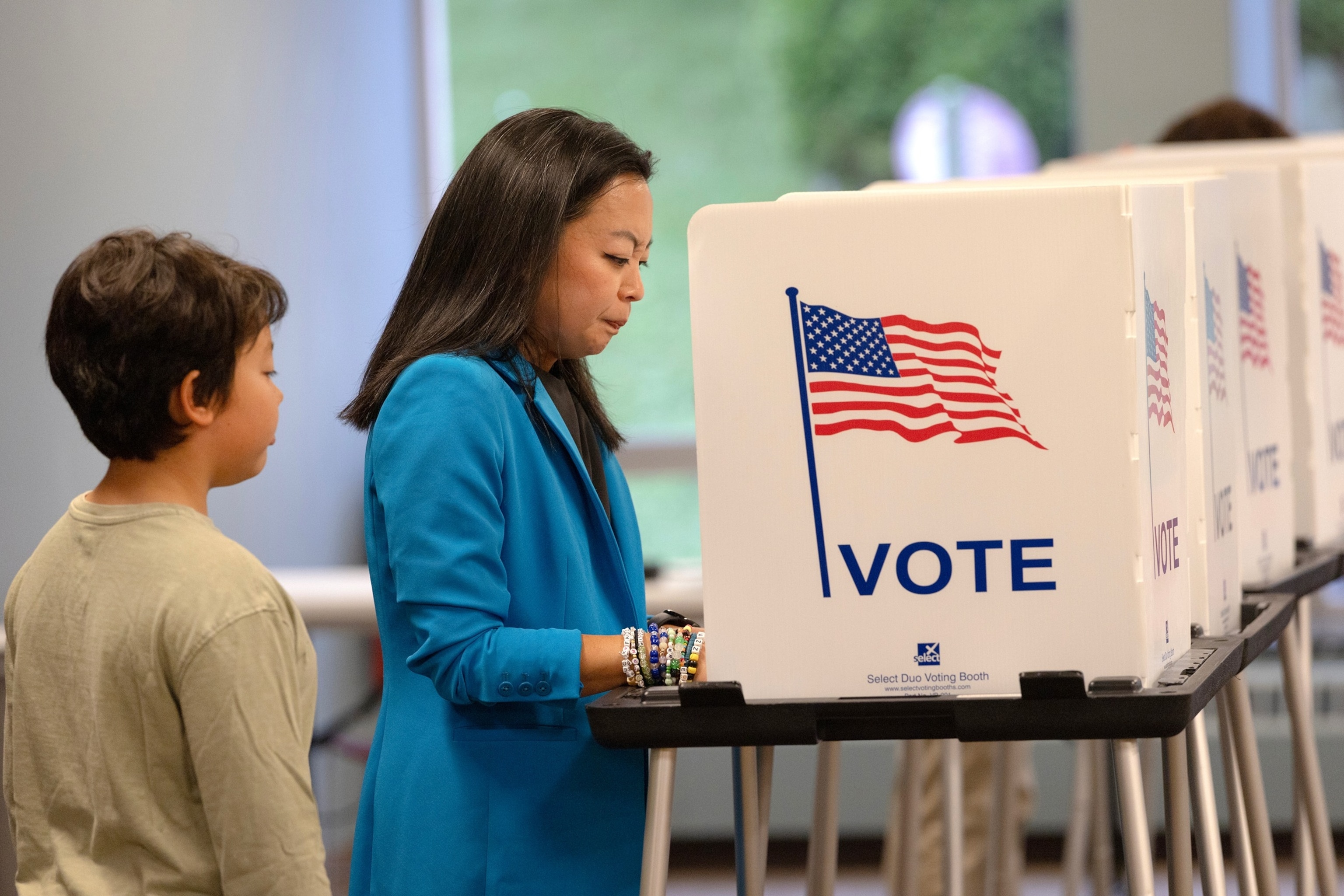 With her son George by her side, Democratic Wisconsin Gubernatorial candidate Francesca Hong votes in the primary election on Aug. 11, 2026, in Madison, Wisconsin.Scott Olson/Getty Images