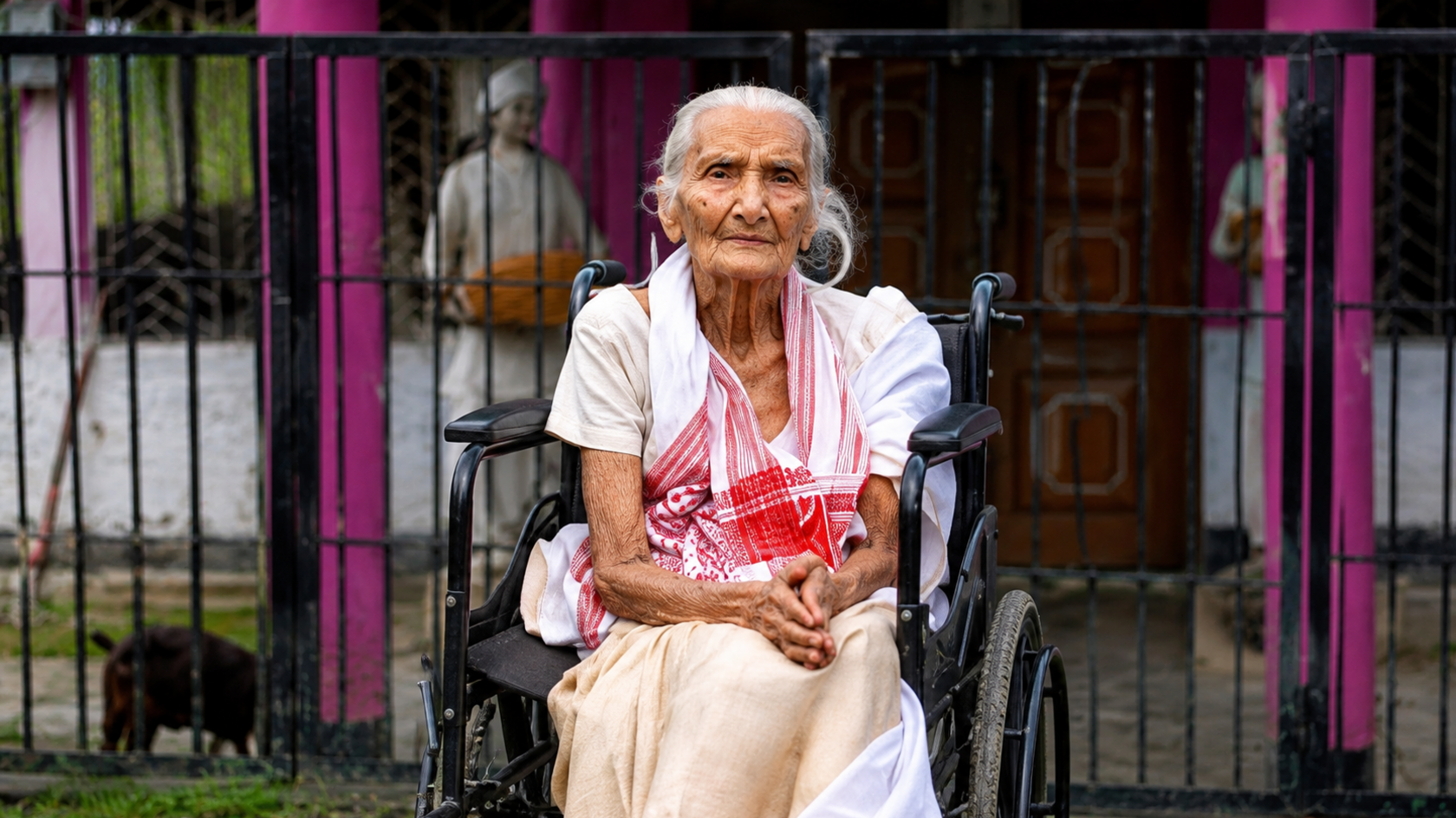 Image caption,A 97-year-old Lokada Duarah was carried onto a banana tree trunk and taken to safety after floodwaters rose around her home