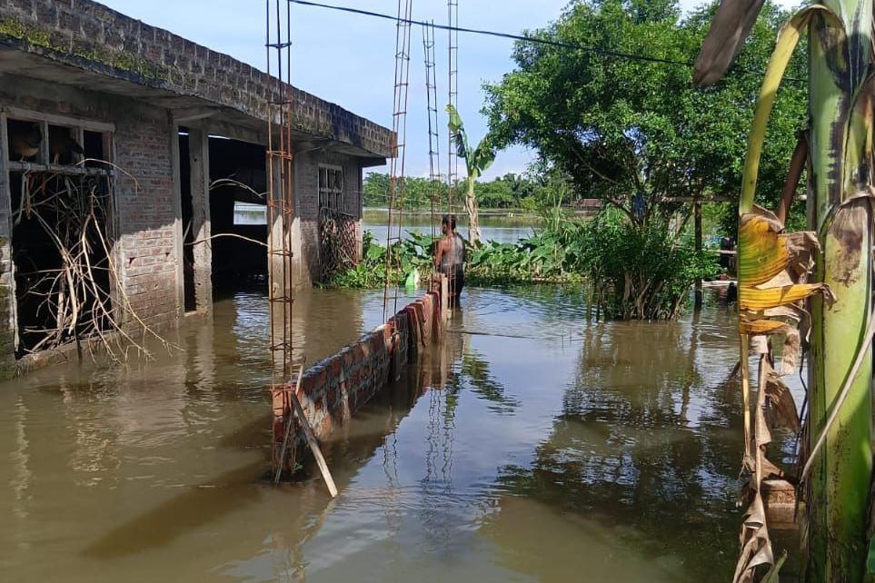 Image caption,Baruah and her family abandoned their home nearly a day after the water began rising