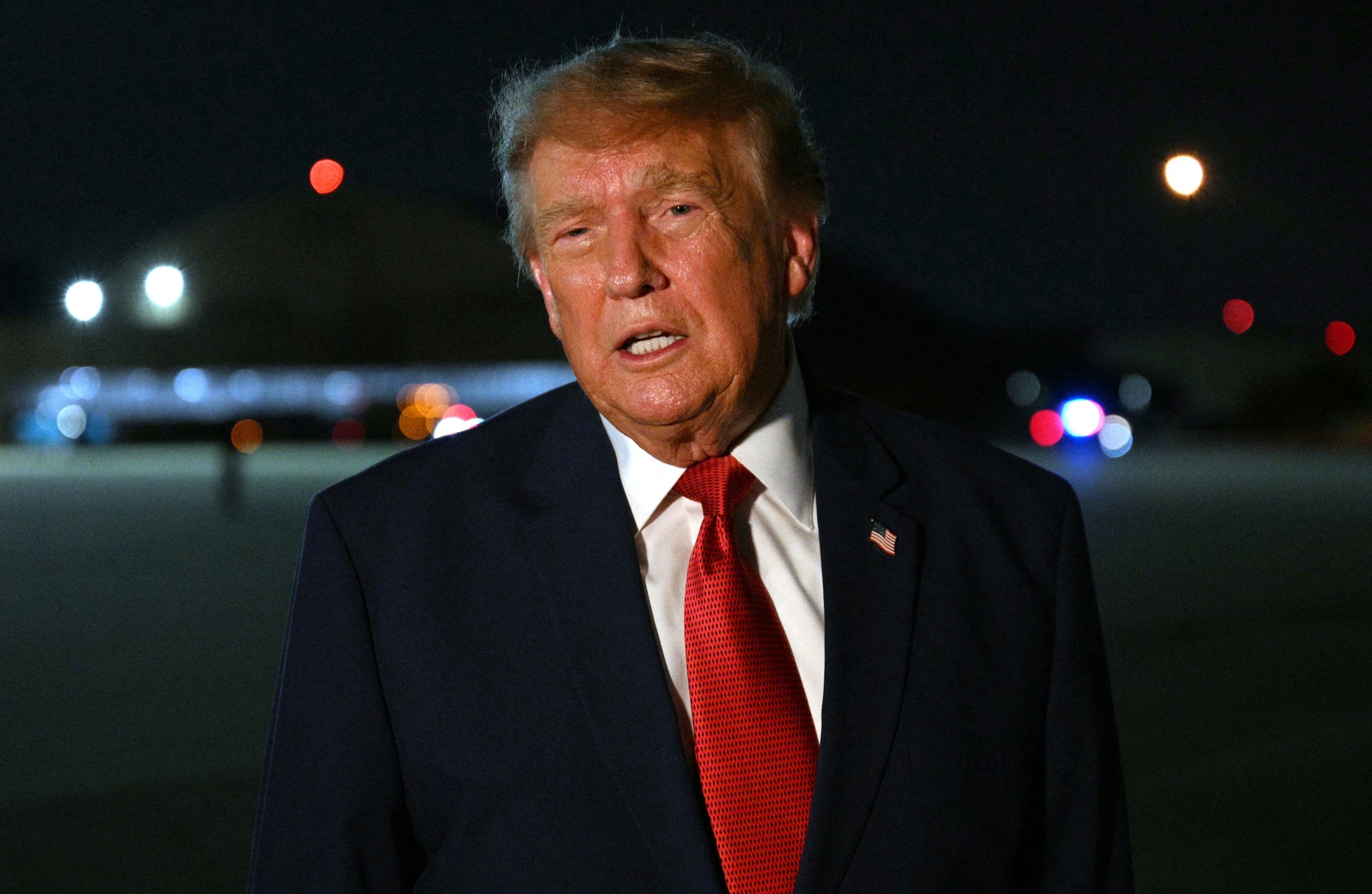 President Donald Trump speaks to members of the media after disembarking Air Force One at Joint Base Andrews, Maryland, August 11, 2026.Jim Watson/AFP via Getty Images