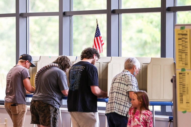 Voters cast their ballots at a polling location inside Chippewa Valley Technical College in Eau Claire, Wis. on Tuesday.Steven Garcia / Bloomberg via Getty Images