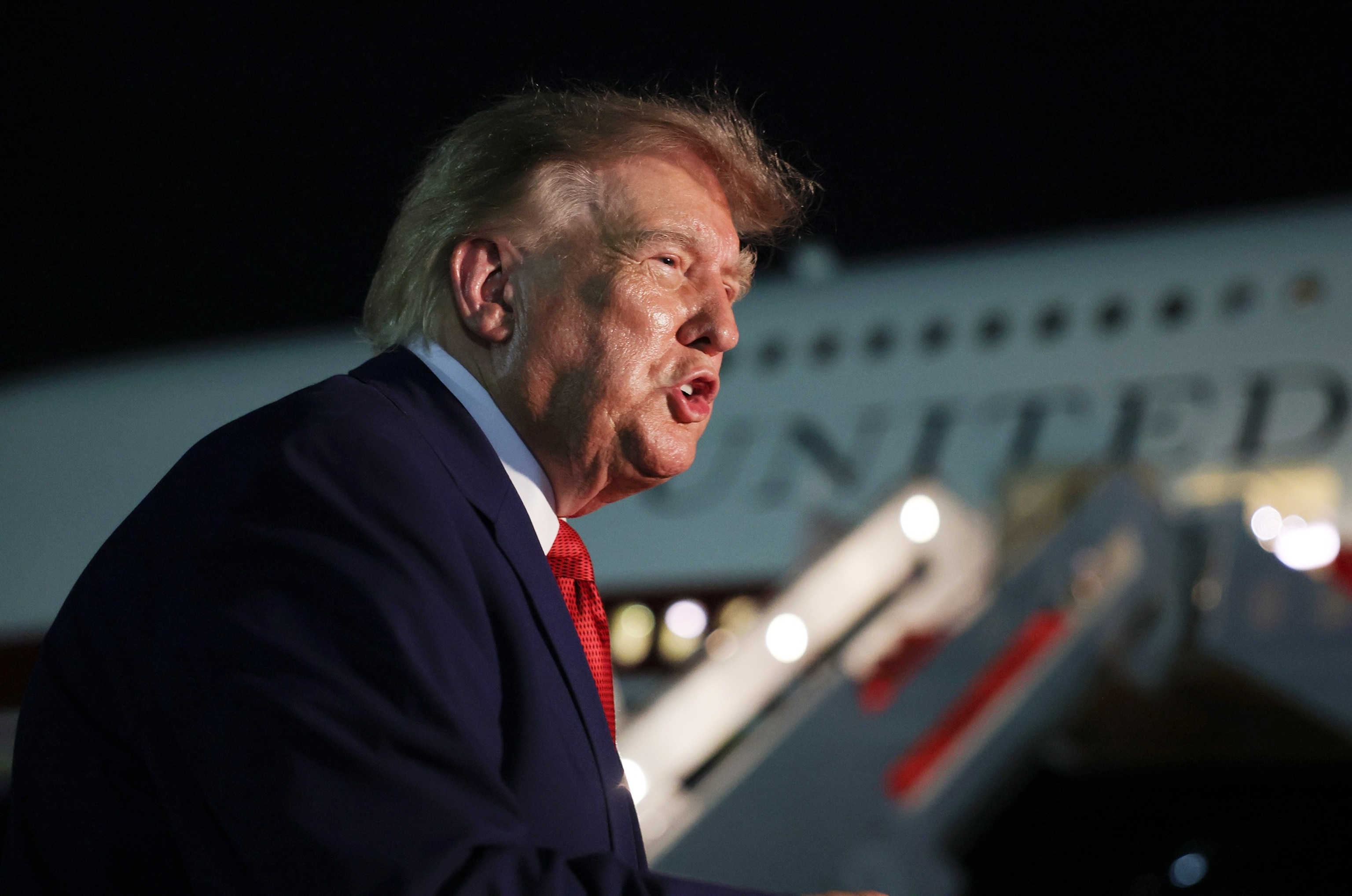 JOINT BASE ANDREWS, MARYLAND - AUGUST 11: U.S. President Donald Trump speaks to reporters after stepping off Air Force One on August 11, 2026 in Joint Base Andrews, Maryland. Trump was asked about the secret decoy flight he took out of Turkey in a military aircraft. The president was returning to Washington, DC after traveling to Ohio to attend the 2026 Patriot Games.Anna Moneymaker/Getty Images
