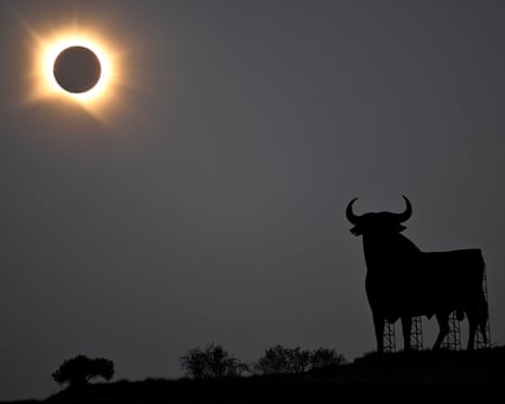 The Sun's corona glows as the moon completely blocks the Sun during the totality phase of the total solar eclipse as seen from San Asensio, La Rioja region, Spain.Photograph: Ander Gillenea/AFP/Getty Images
