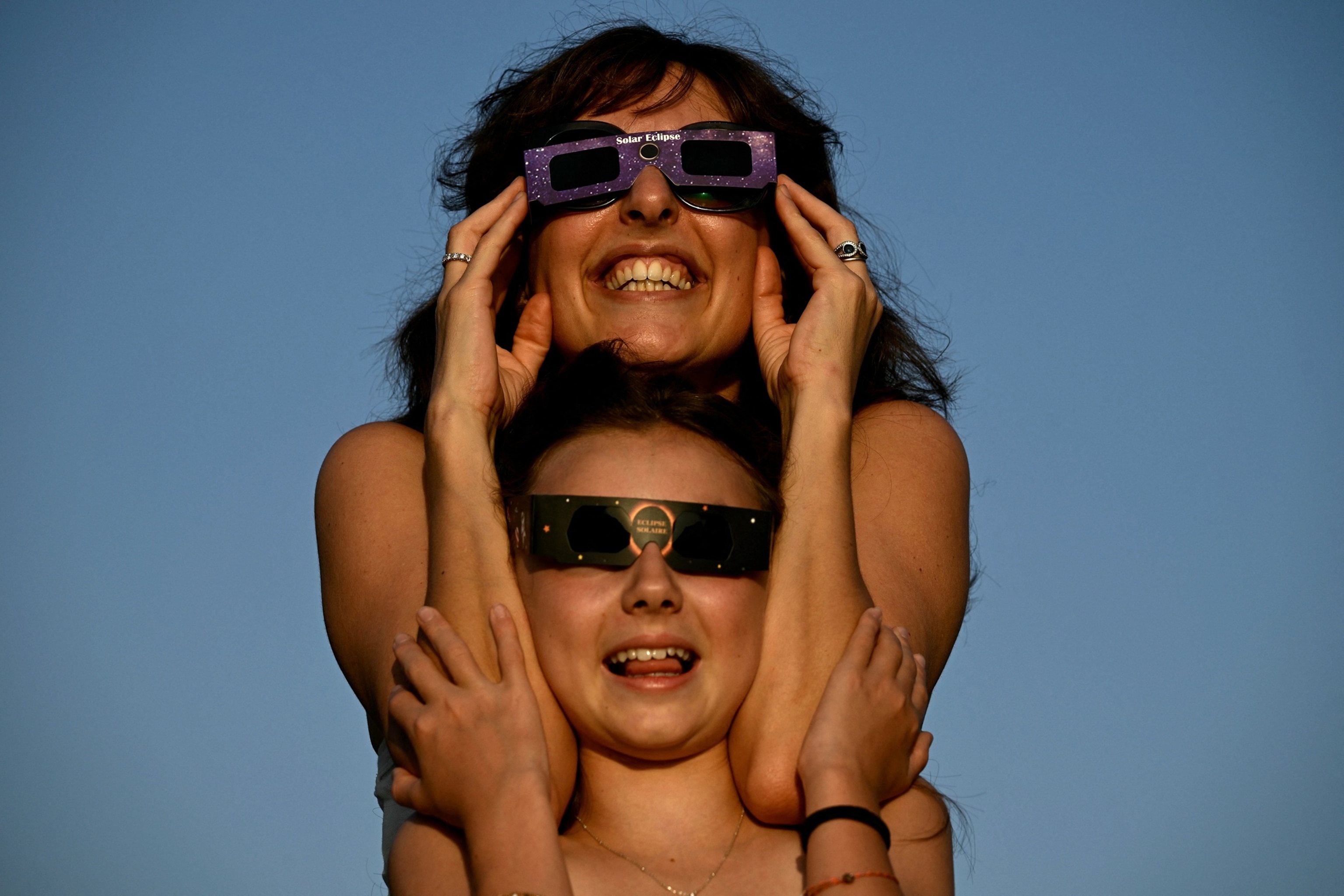 People use solar eclipse viewing glasses to look at the partial solar eclipse at Abbadia, le ChÃ¢teau Observatoire in Hendaye, southwestern France, August 12, 2026.Philippe Lopez/AFP via Getty Images