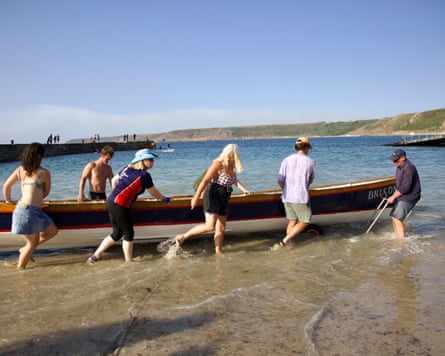 Some set out to sea to see the eclipse.Photograph: Luke Gartside/The Guardian
