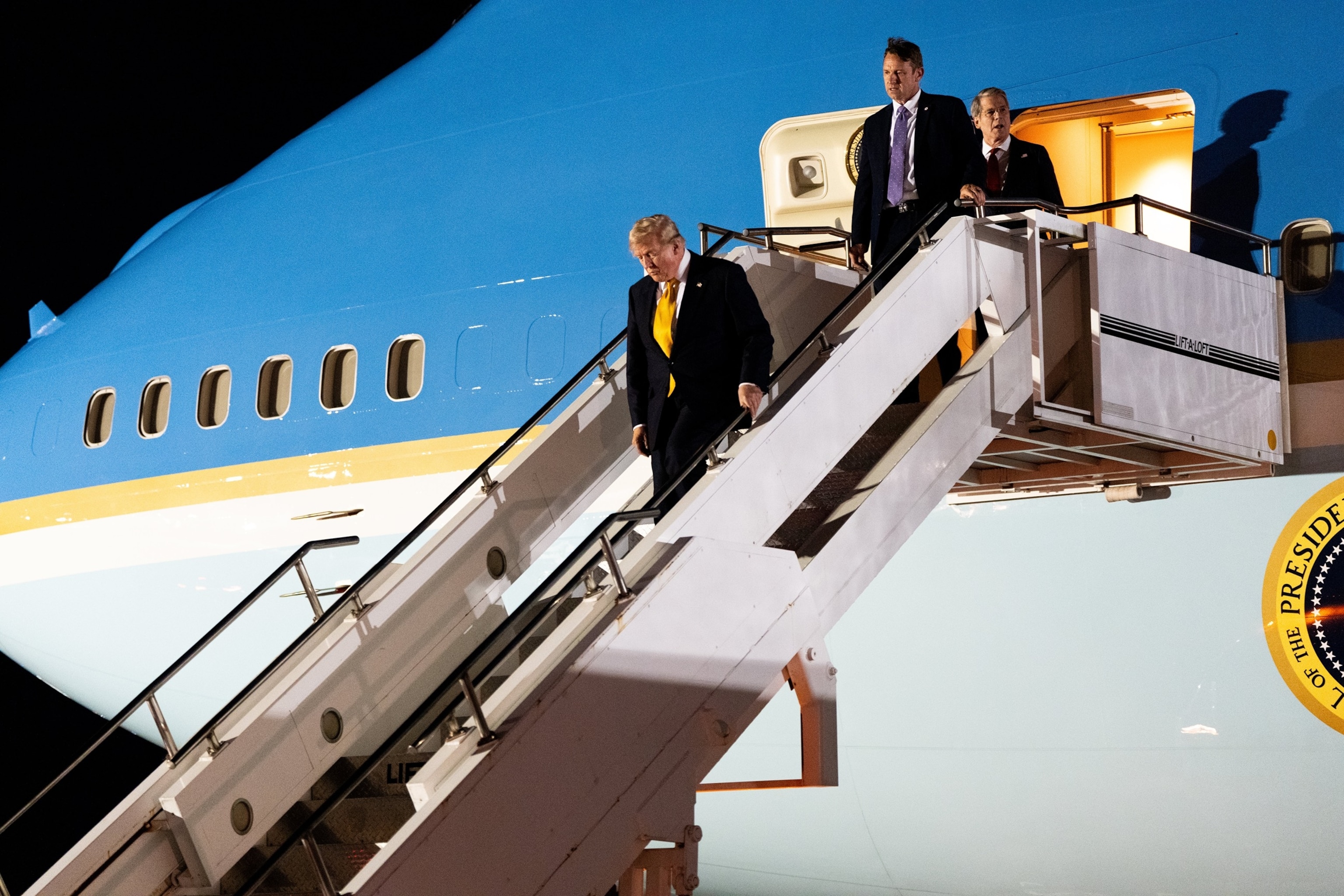 President Donald Trump walks from the legacy Air Force One at U.S. Air Force Base, RAF Mildenhall in Suffolk Eastern England, as he switches planes on his way back to Washington from the NATO summit in Ankara, Turkey, July 8, 2026.Alex Brandon/AP Photo