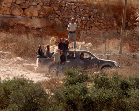 Yousef Hassan said Israeli settlers throw stones, use obscene language and shout during the night.Photograph: Alaa Badarneh/EPA