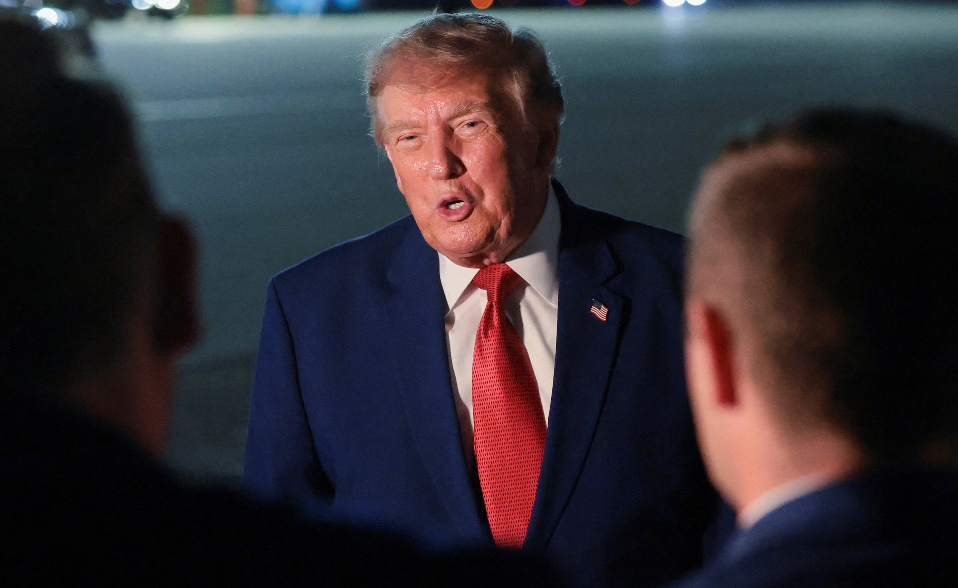 President Donald Trump speaks to members of the media after disembarking Air Force One at Joint Base Andrews, Maryland, August 11, 2026.Kylie Cooper/Reuters