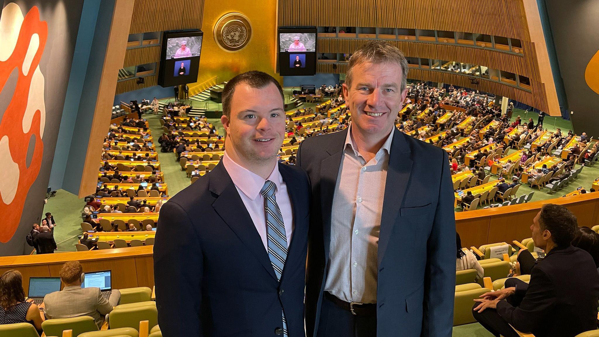 Image caption,Darryl Steff (R) is the CEO of Down Syndrome Australia, and Michael Cox (L) is a board member