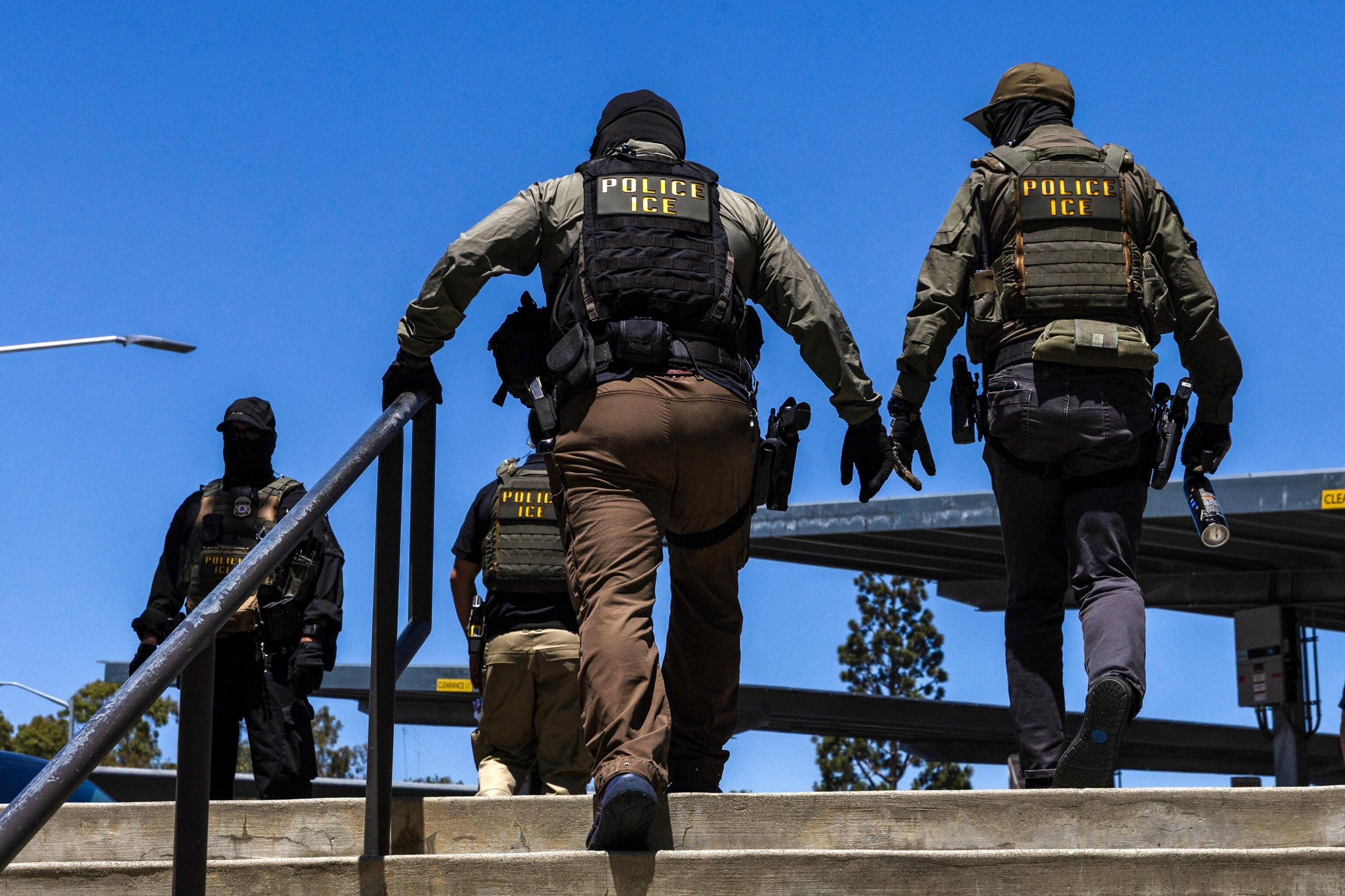 Immigration and Customs Enforcement (ICE) agents walk outside the Ventura County Government Center in Ventura, California, on July 27, 2026.Blake Fagan/AFP via Getty Images