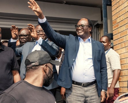 Brian Mundubile, the main opposition challenger, waves to supporters as he leaves a radio station in Lusaka.Photograph: Gianluigi Guercia/AFP/Getty