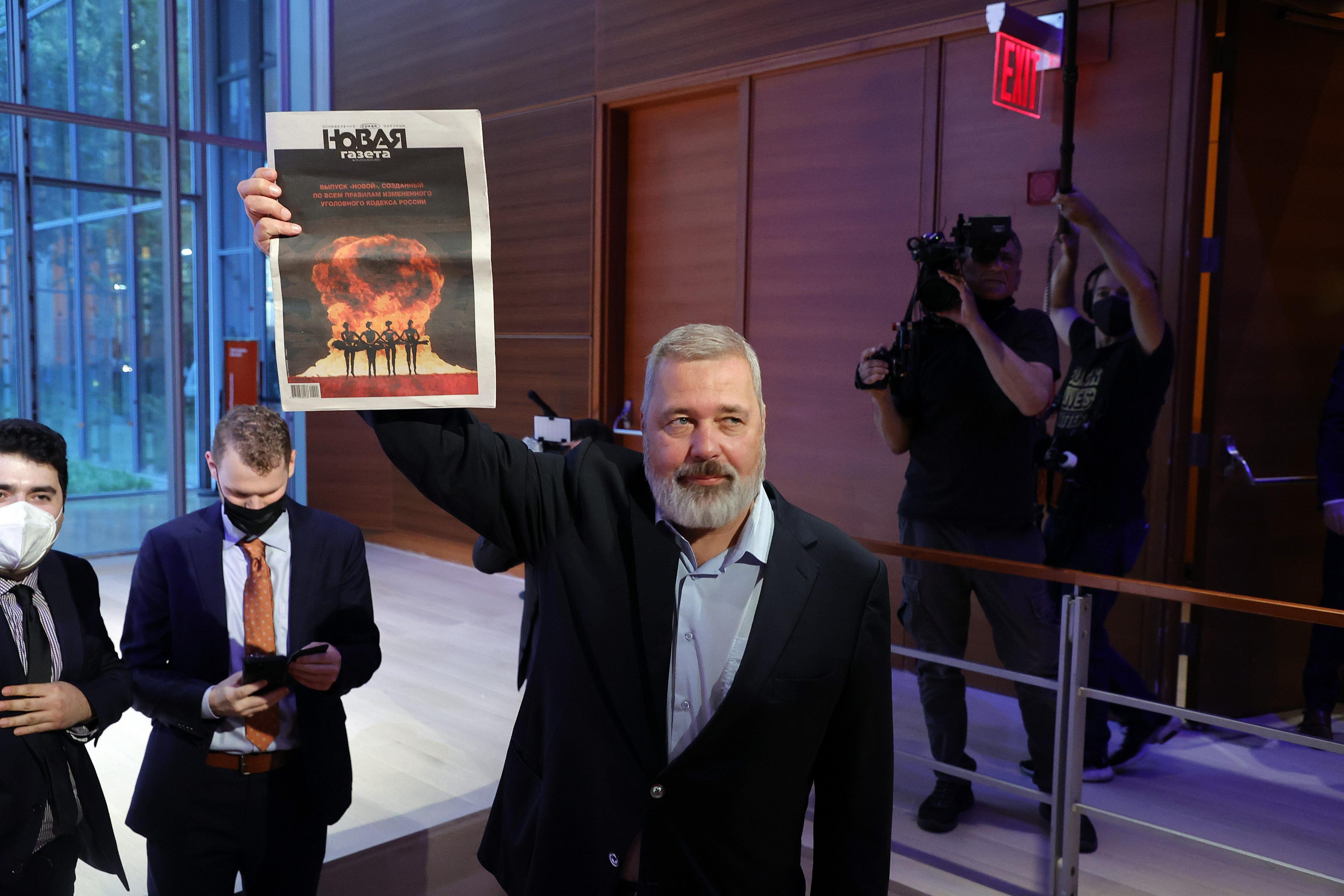 Image caption,Muratov auctioned off his Nobel Prize medal to support UNICEF's humanitarian efforts to support Ukrainian refguees