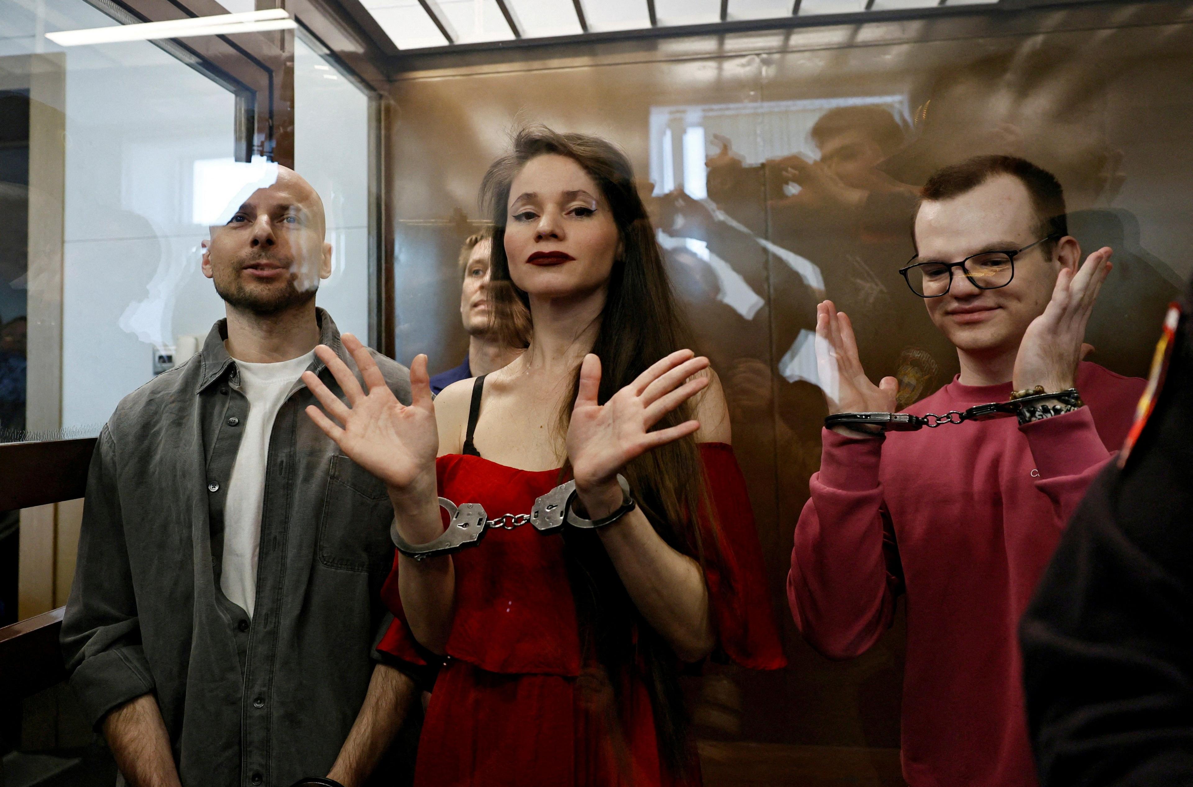 Image caption,Journalists Antonina Favorskaya, Konstantin Gabov, Sergey Karelin and Artyom Kriger were jailed on extremism charges for five and half years