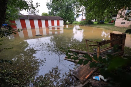 Floodwaters cover several yards in Crooksville, Ohio, on Wednesday.Photograph: Gene J Puskar/AP