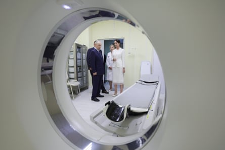 Putin visits a hospital.Photograph: Gavriil Grigorov/SPUTNIK/KREMLIN POOL/EPA