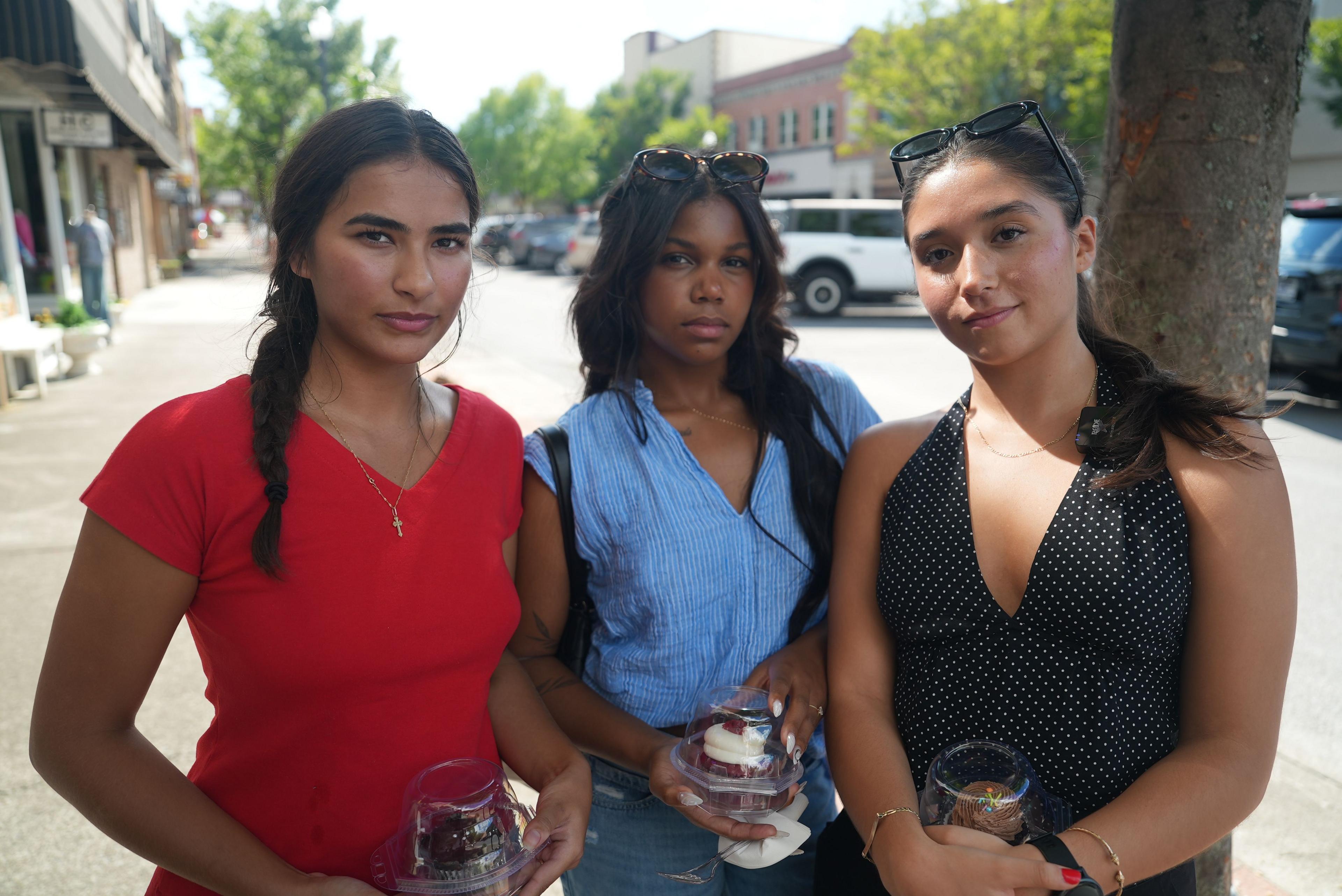 Image caption,Caden Bayless, Mary Herron and Emily Villalpando are 21-year-old liberals