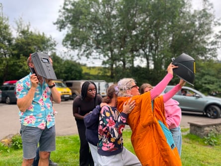 Deniz (in orange) with friends and two families.Photograph: Tom Harrup/Guardian community