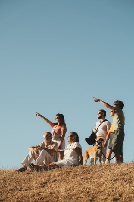 Pauline’s family watching the eclipse in northern Belgium.Photograph: Pauline Vandewiele/Guardian community
