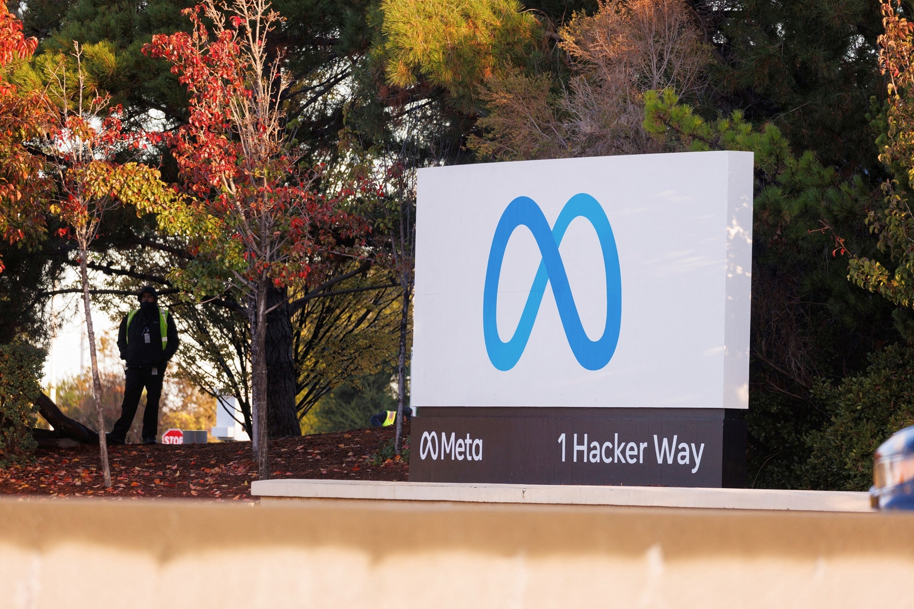 A security guard stands watch by the Meta sign outside the headquarters of Facebook parent company Meta Platforms Inc in Mountain View, California, November 9, 2022.Peter Dasilva/Reuters