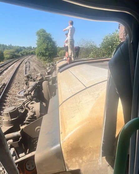 Emergency services respond to the derailed train between Haywards Heath and Lewes.Photograph: PA