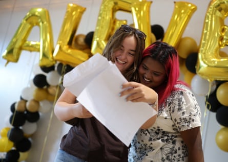 Students at Harris academy in Wimbledon collect their A-level results on Thursday.Photograph: Isabel Infantes/Reuters