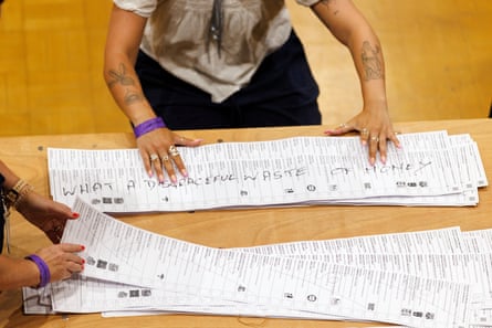 Election workers sort through spoilt ballots at Clacton Leisure Centre.Photograph: Dan Kitwood/Getty Images
