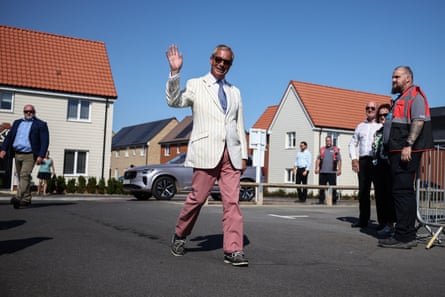 Nigel Farage makes an appearance in Clacton. ‘The look on that guy’s face is pure admiration.’Photograph: Henry Nicholls/AFP/Getty