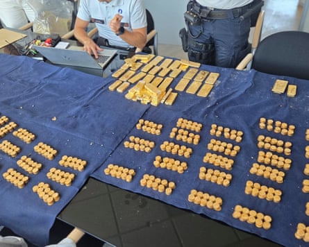 The trove included gold coins, nuggets and numbered bullion bars.Photograph: Facebook/Dendermonde Local Police