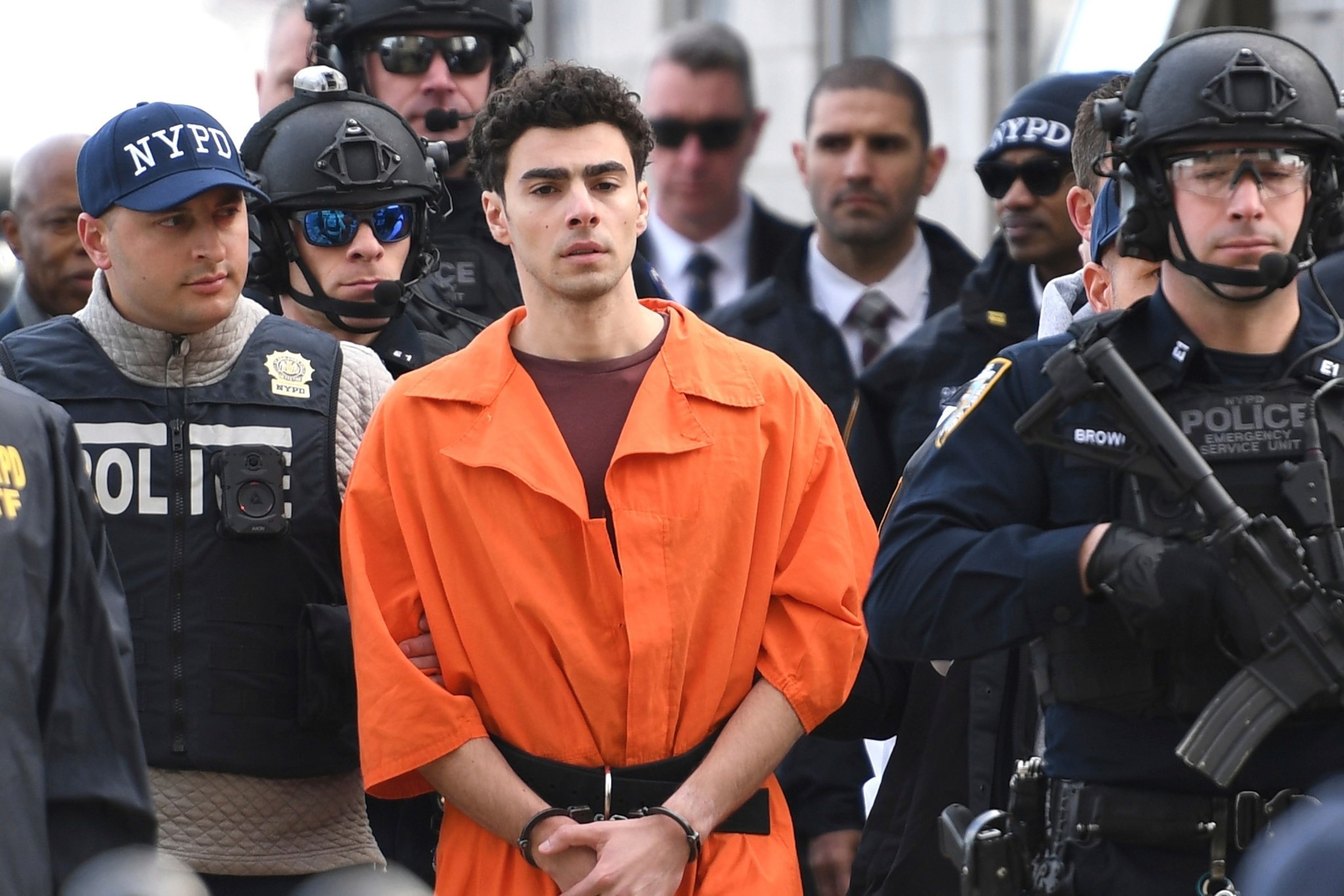 Luigi Mangione, a suspect in the fatal shooting of UnitedHealthcare CEO Brian Thompson, is escorted by police, Dec. 19, 2024, in New York City.Pamela Smith/AP Photo