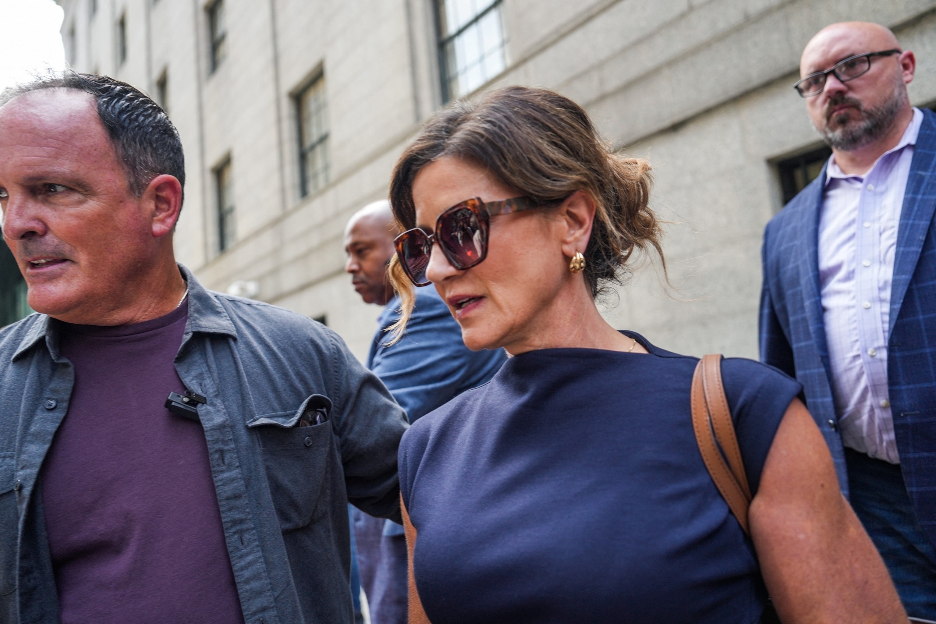 Stickers are seen outside a federal court where Luigi Mangione is set to attend a pretrial conference in New York City, August 14, 2026.Sarah Yenesel/EPA/Shutterstock