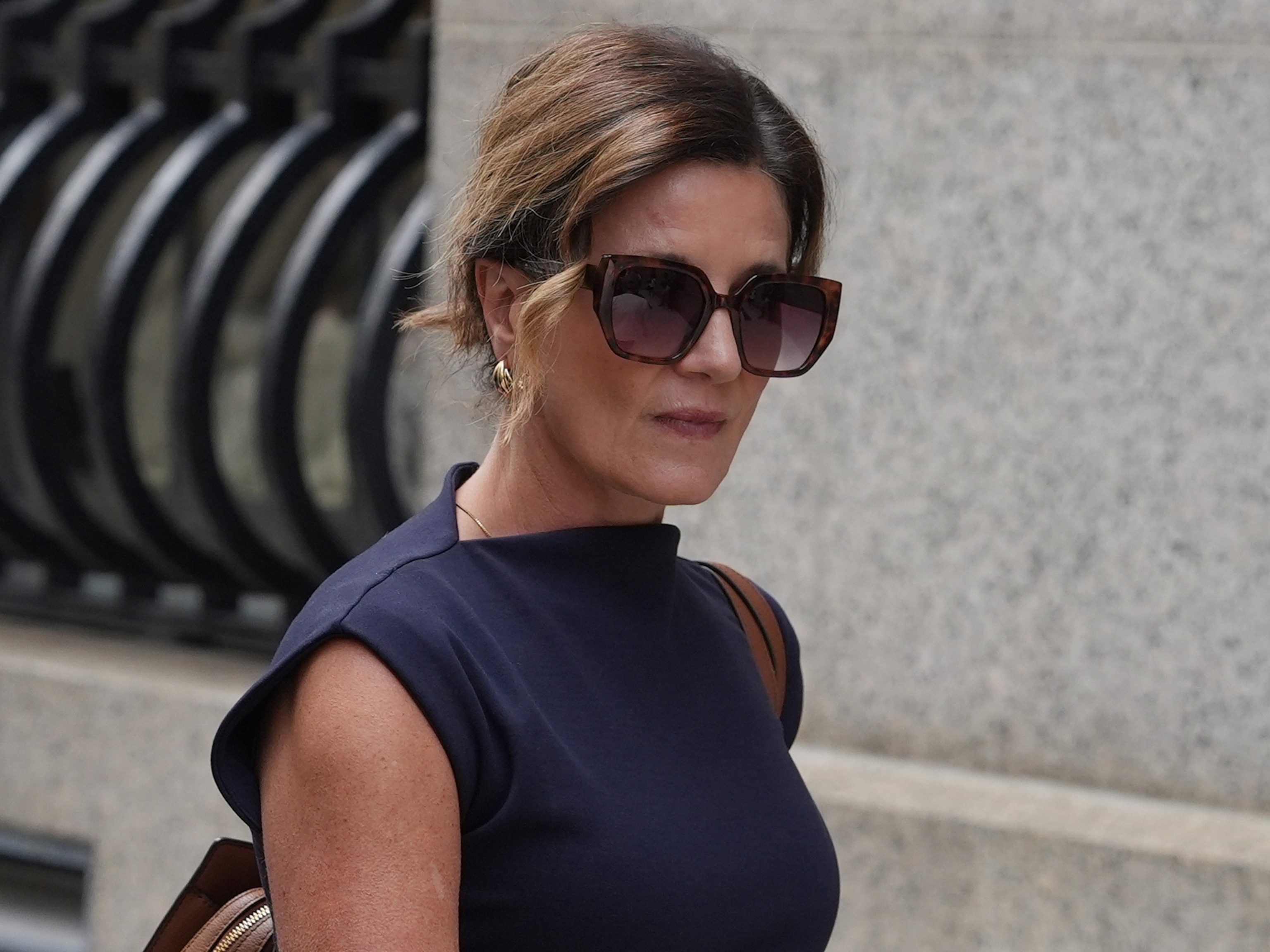 Paulette "Pauley" Thompson exits Manhattan federal court after Luigi Mangione pleaded guilty on to federal stalking charges in the killing of her husband, UnitedHealthcare CEO Brian Thompson, Aug. 14, 2026 in New York.Ryan Murphy/AP Photo