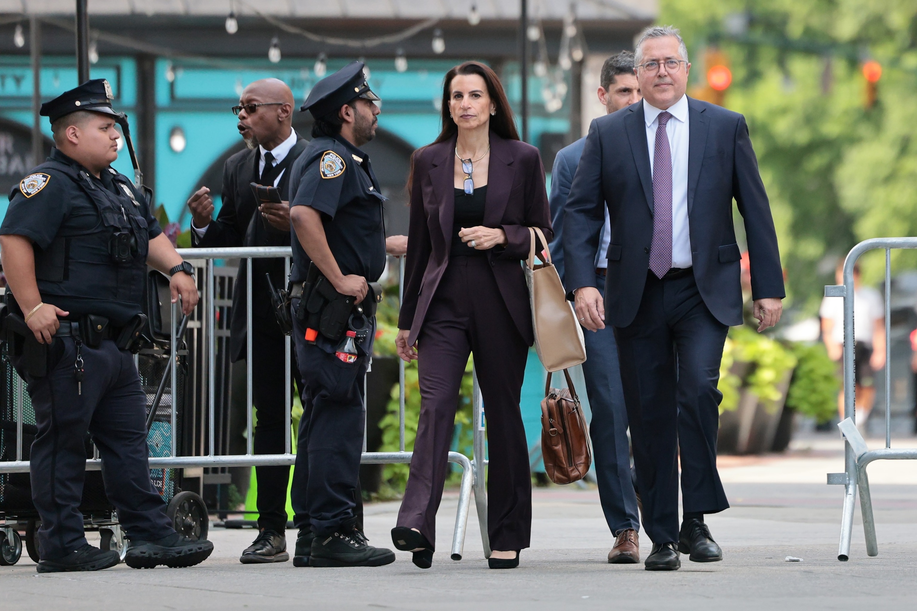 Defense attorneys for Luigi Mangione, Marc Agnifilo and Karen Friedman Agnifilo exit Manhattan federal court after Mangione pleaded guilty on to federal stalking charges in the killing of UnitedHealthcare CEO Brian Thompson, Aug. 14, 2026 in New York City.Ryan Murphy/AP Photo