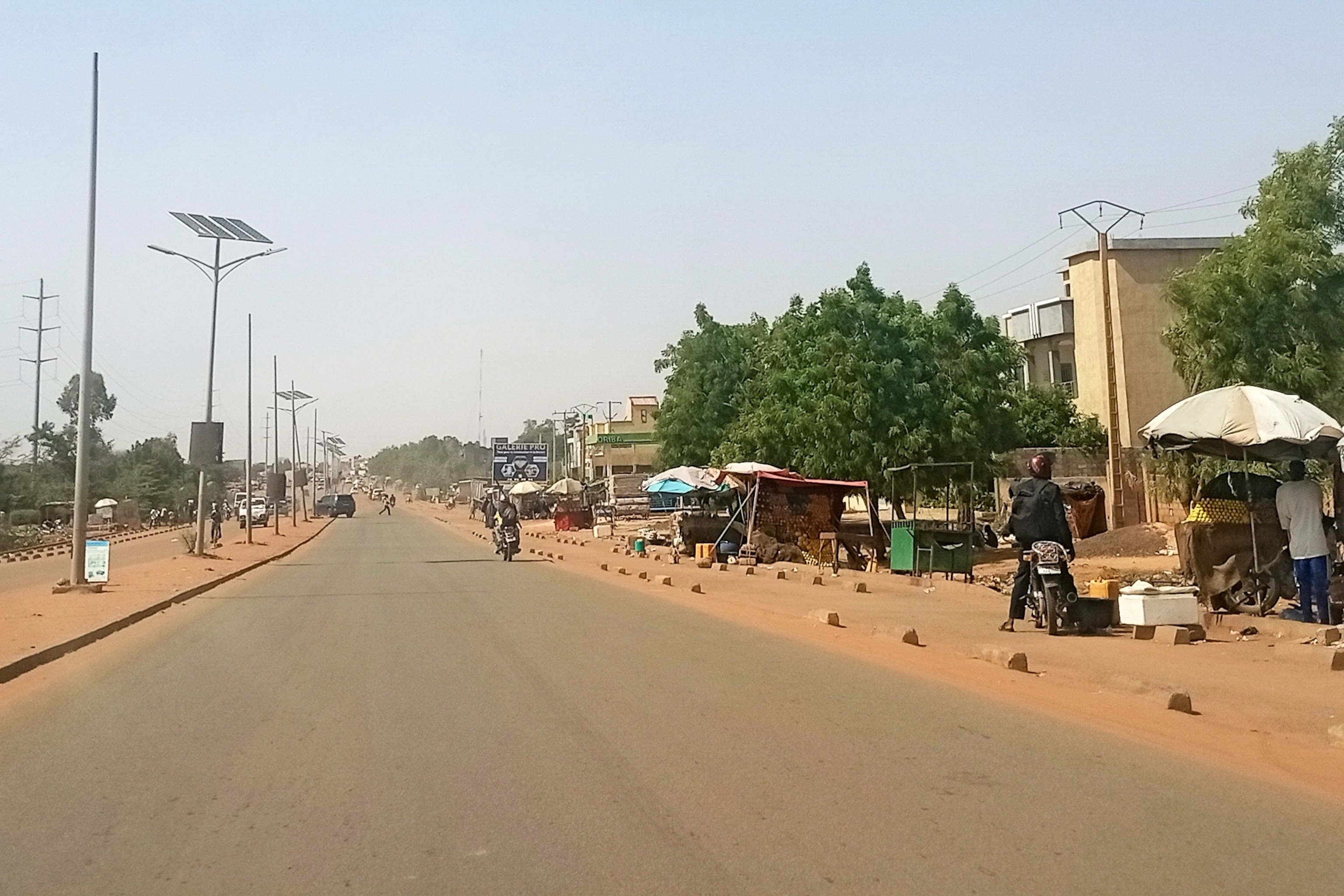 A motorcyclist rides along a street in Niamey, Niger, June 18, 2026.AP Photo